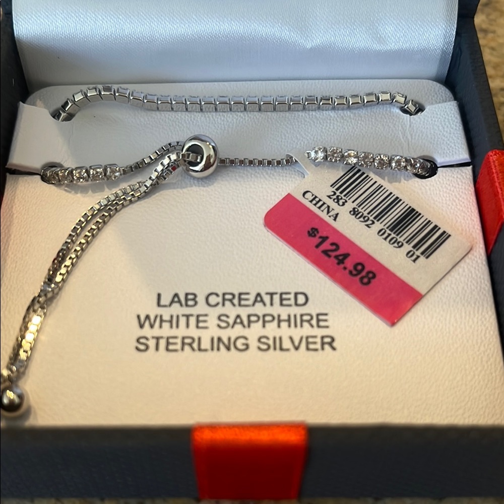Silver and White Infinity Knot Bracelet with Adjustable Closure